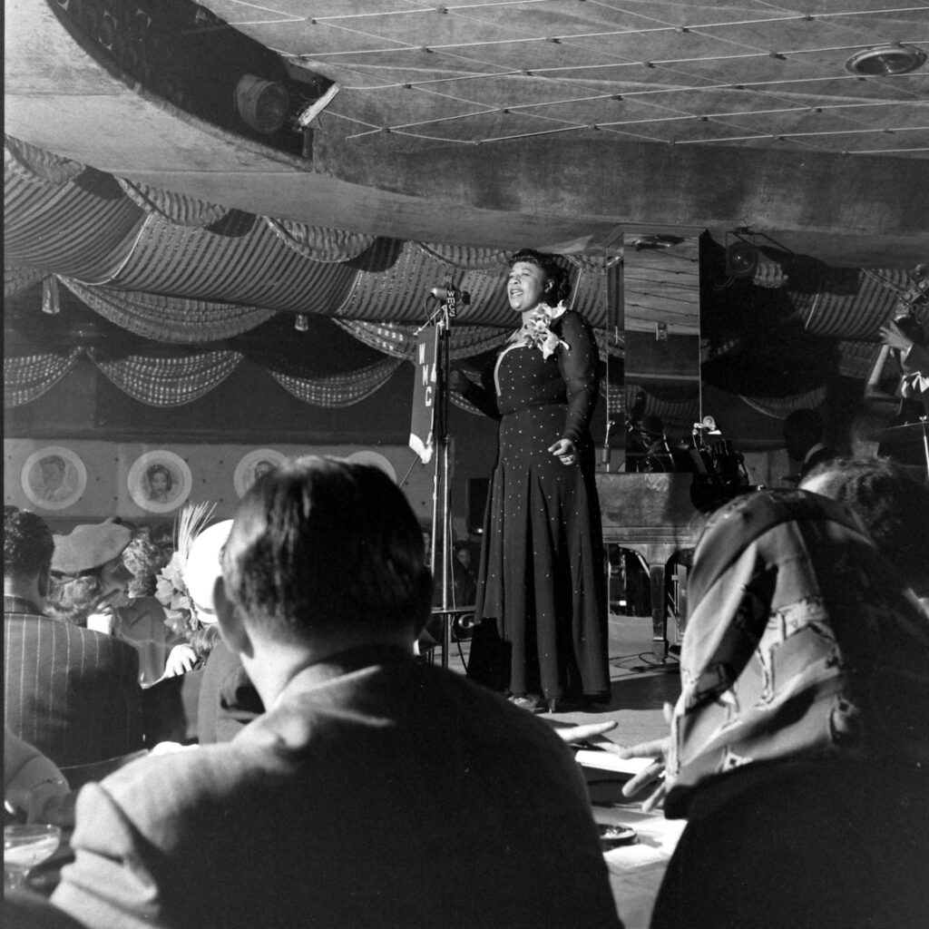 Ella Fitzgerald sang during opening night of Bop City nightclub in New York City, April 1949.