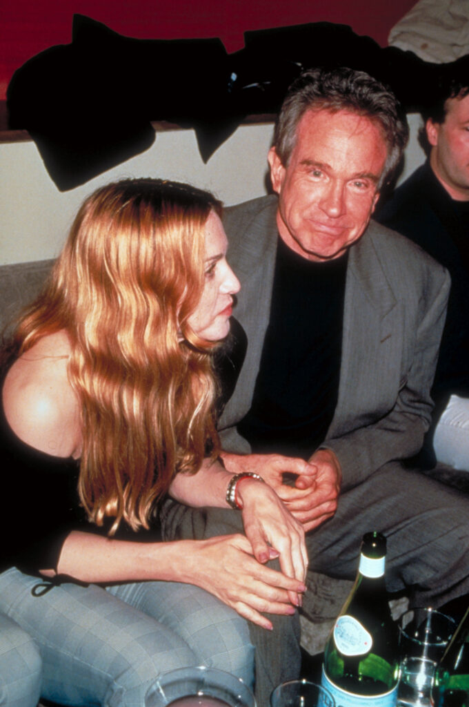 Former flames Warren Beatty and Madonna at the nightspot Moomba for the premiere party of the 1997 motion picture Two Girls and a Guy.
